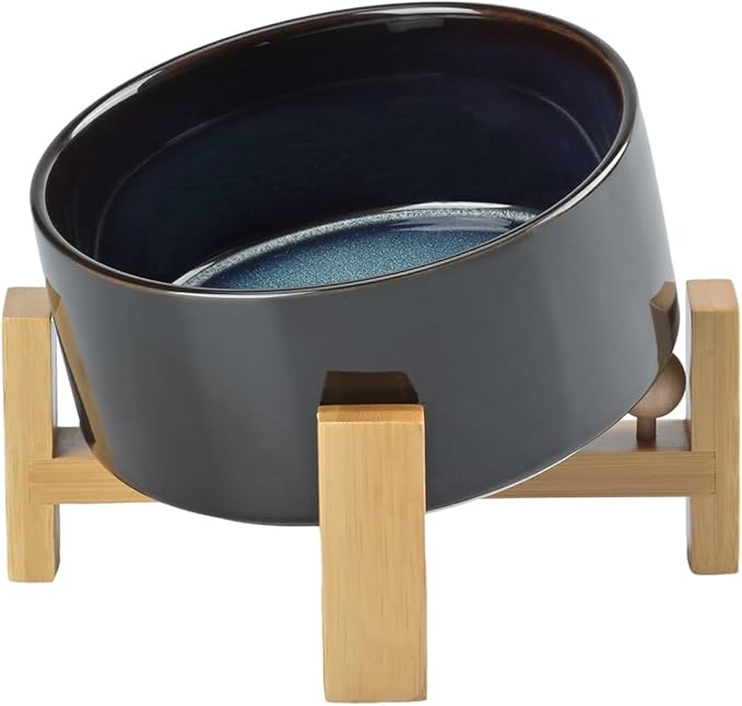 SPUNKYJUNKY 15° Slanted Ceramic Dog and Cat Bowl with Wooden Stand, Tilted Bulldog Food and Water Bowl No Slip Non-Spill for Cats Medium Dogs Big Face Pets 28.7 OZ (3.6 Cups, Starry Blue)