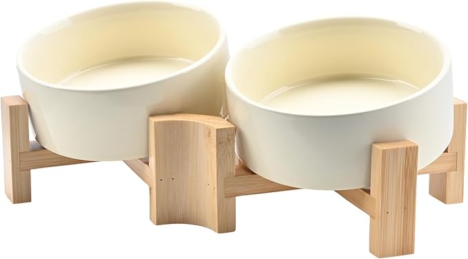SPUNKYJUNKY 15° Slanted Ceramic Dog and Cat Bowl with Wooden Stand, Tilted Bulldog Food and Water Bowl No Slip Non-Spill for Cats Medium Dogs Big Face Pets 13.5 OZ (1.7 Cups, Beige × 2)