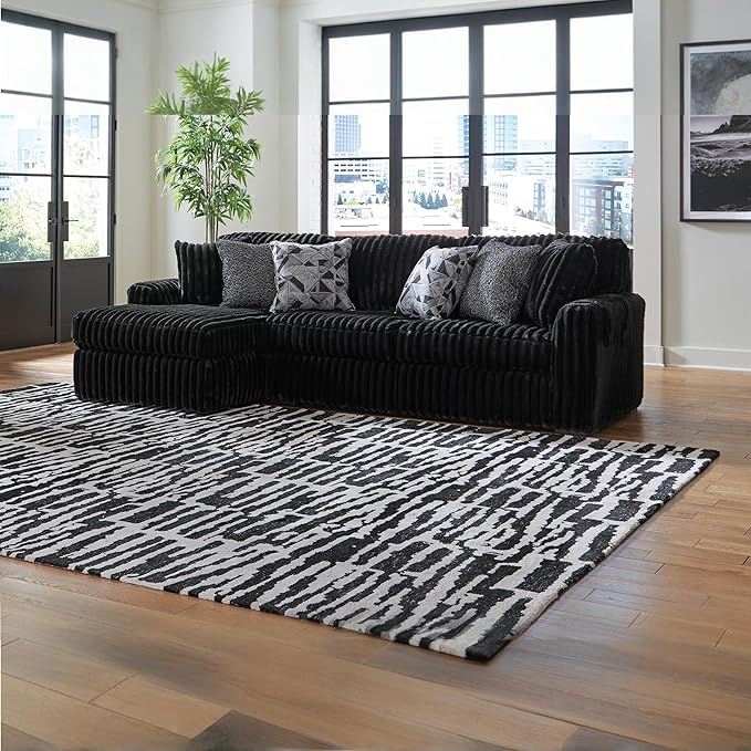 Signature Design by Ashley Midnight-Madness 2-Piece Sectional Sofa with Chaise, Faux Wood Finish Accent Legs, Fabric Upholstery, 120" W x 65" D x 40" H, Black